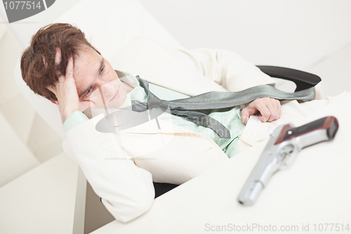 Image of Depressed businessman to prepare for kill oneself