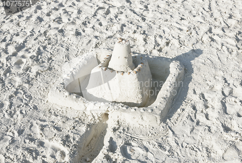 Image of Sand castle on a sunny beach