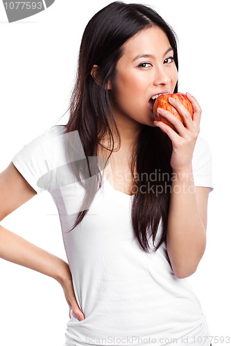 Image of Asian woman eating apple