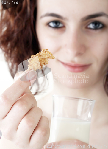 Image of Young people eating milk with cereals