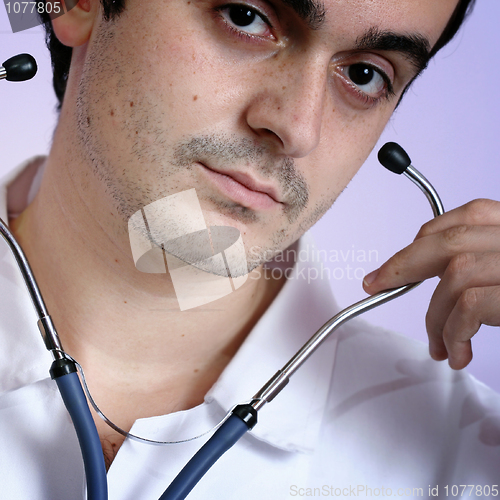 Image of Portrait of a young doctor with stethoscope.