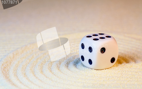 Image of White dice with black dots