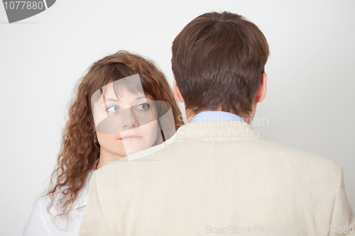 Image of Man and woman stand nearby in pressure