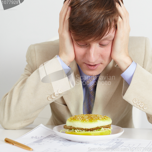 Image of Young man was going to eat rotten meal