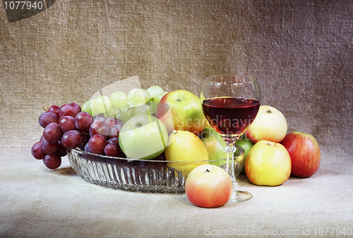 Image of Classical still-life with fruit and wineglass