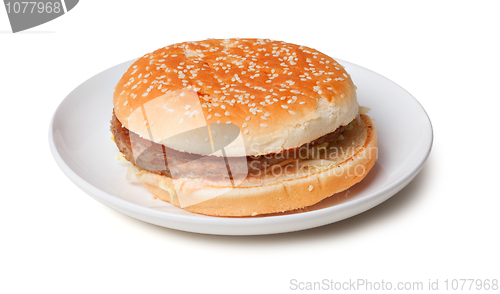 Image of Stale hamburger on a plate isolated on white background