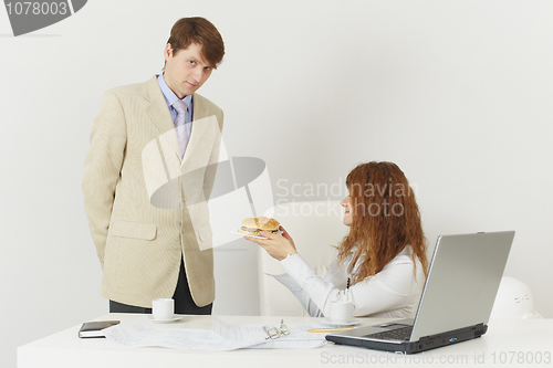 Image of Two businessmen during lunch break