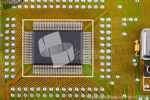 Image of Microcircuit soldered to an electronic plate