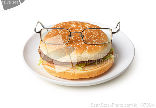 Image of Amusing hamburger in spectacles isolated on white background