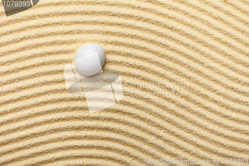 Image of Abstract composition -  sandy wavy background and glass drop