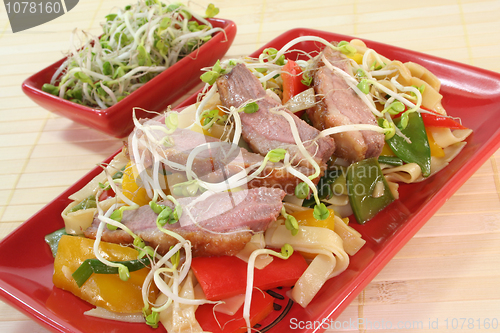 Image of Duck breast with fried noodles