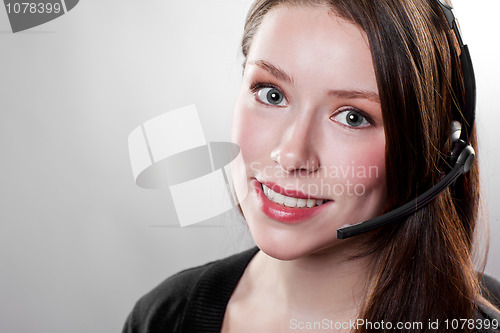 Image of Businesswoman wearing a headset