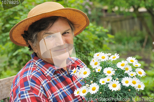 Image of Senior woman gardening