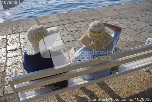 Image of Two ladies with nice hats