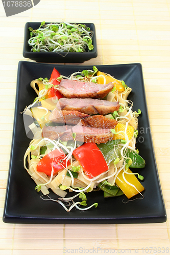 Image of Duck breast with fried noodles