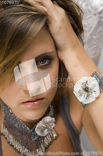 Image of closeup portrait of the beautiful woman with choker 