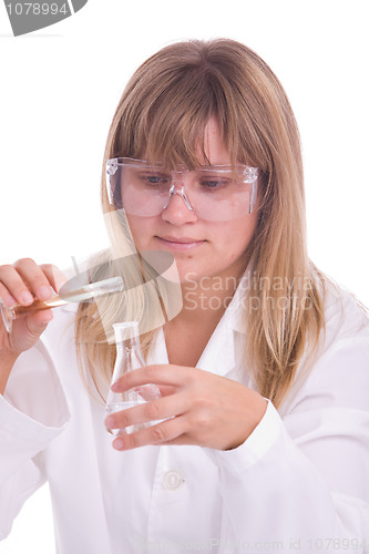 Image of Woman-researcher working with chemicals