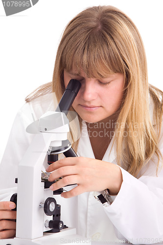 Image of Woman in a laboratory with microscope