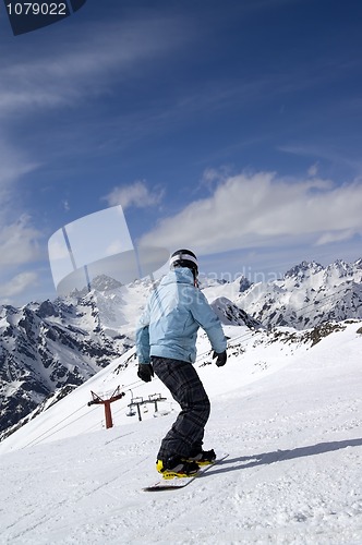 Image of Snowboarder on ski slope