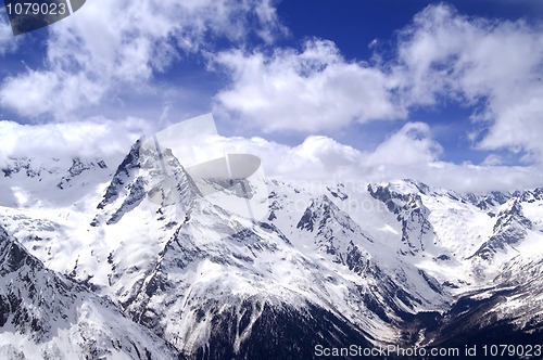 Image of Caucasus Mountains in cloud. Dombay