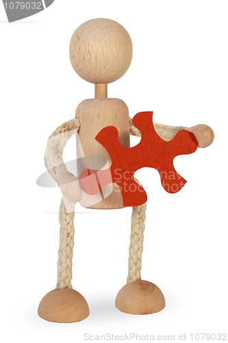 Image of A figure holds a puzzle