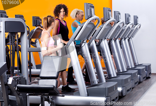 Image of lady instructor in gym