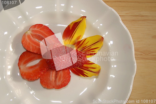 Image of strawberry and tulip petals as a decoration