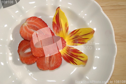 Image of sliced strawberries on a plate