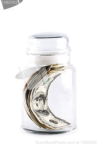 Image of money in glass jar 