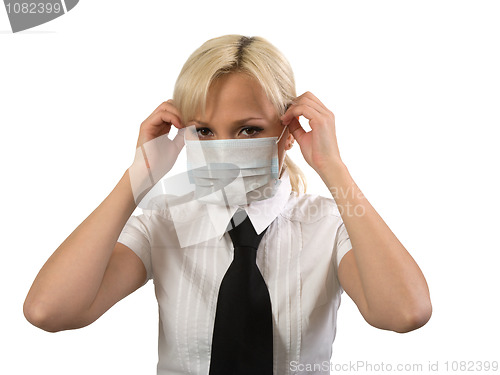 Image of Female in medical mask.