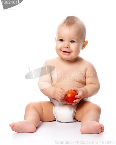 Image of Little child with apple