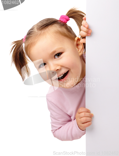 Image of Cute little girl with blank board