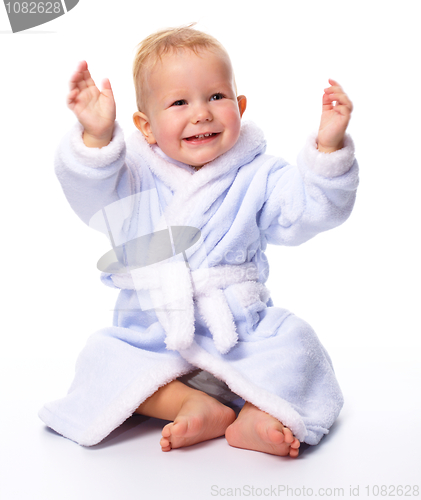 Image of Cute child in bathrobe