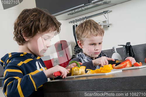 Image of Boys cutting pepper