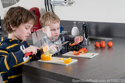 Image of Boys cutting pepper