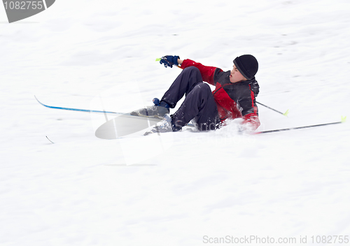 Image of Boy Skier fell on snow