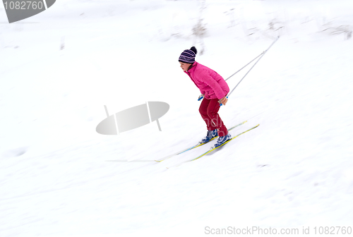 Image of Bright girl Skiing