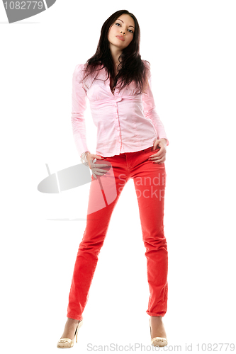 Image of Beautiful young brunette in pink shirt