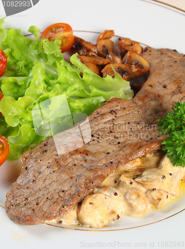 Image of Veal with mushrooms in cream sauce vertical