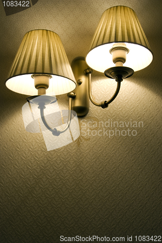 Image of Photo of wall lamp with dim light    