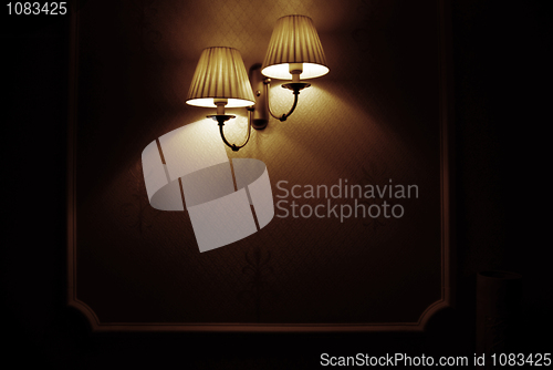 Image of Photo of wall lamp with dim light    