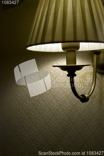 Image of Photo of wall lamp with dim light    
