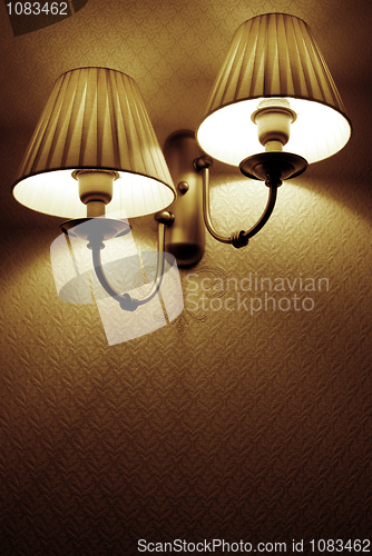 Image of Photo of wall lamp with dim light    