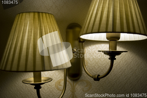 Image of Photo of wall lamp with dim light   