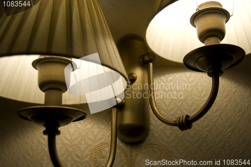 Image of Photo of wall lamp with dim light    