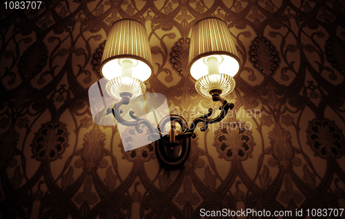Image of Photo of wall lamp with dim light  