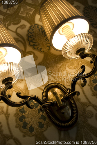 Image of Photo of wall lamp with dim light    