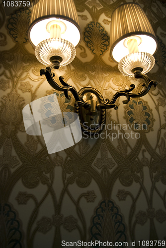 Image of Photo of wall lamp with dim light   