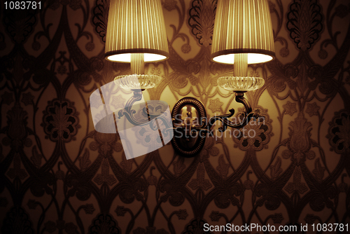 Image of Photo of wall lamp with dim light    