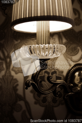 Image of Photo of wall lamp with dim light    